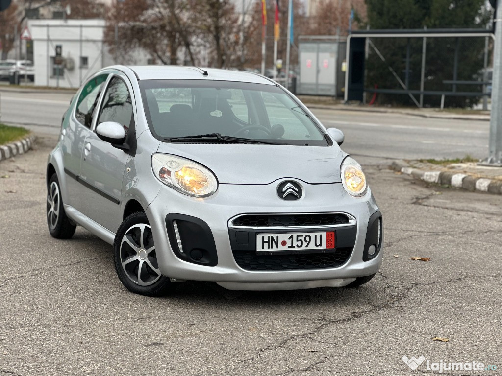 Citroen C1*lumini de zi~led*benzina*4 usi*clima*euro 5*af.2013/luna 03