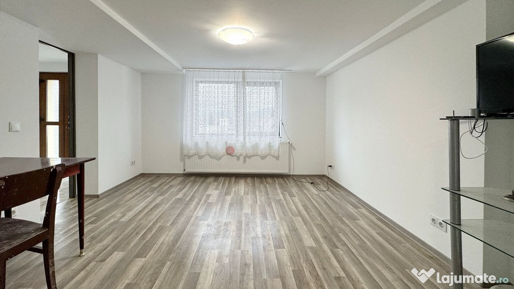 Apartament mobilat utilat si curte proprie