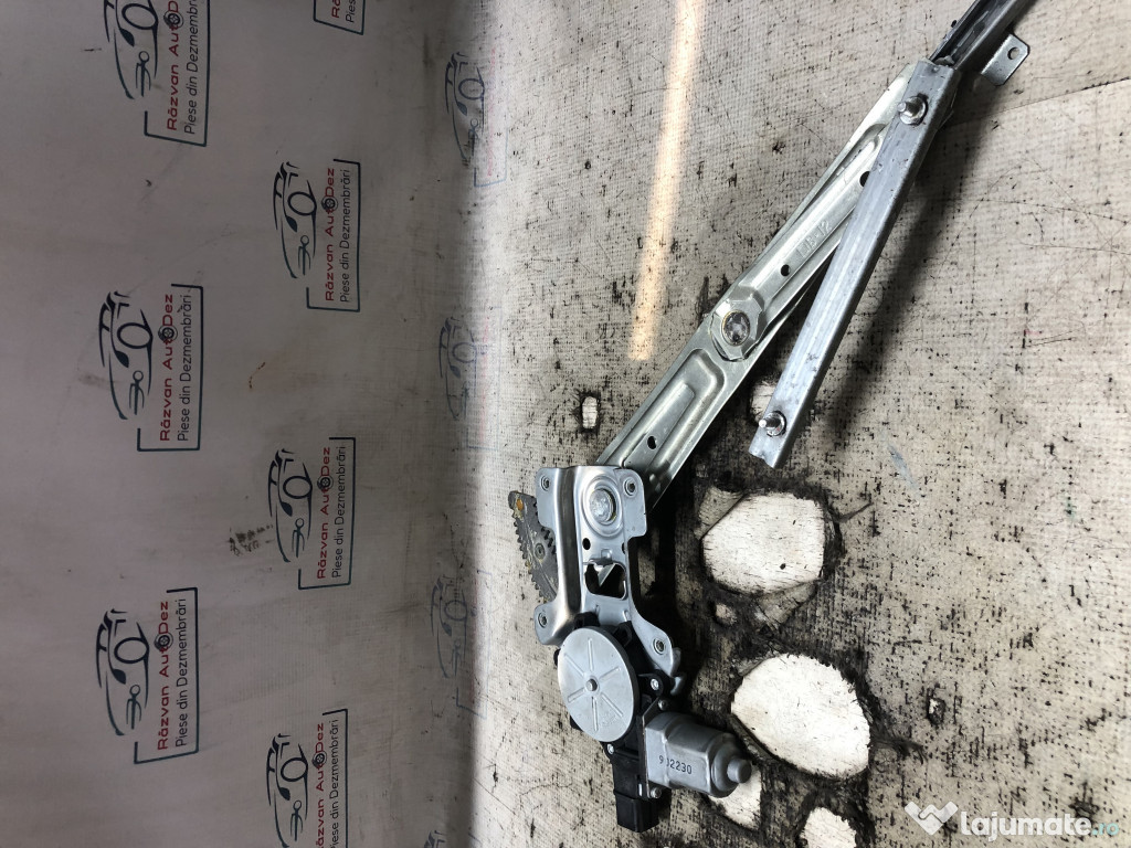 Macara geam stanga fata Mitsubishi Lancer 2010