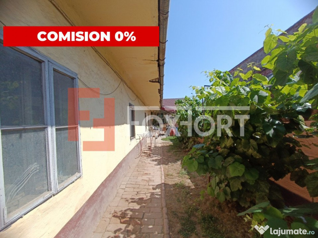 COMISION 0% Casa cu 4 apartamente la curte comuna cu teren t