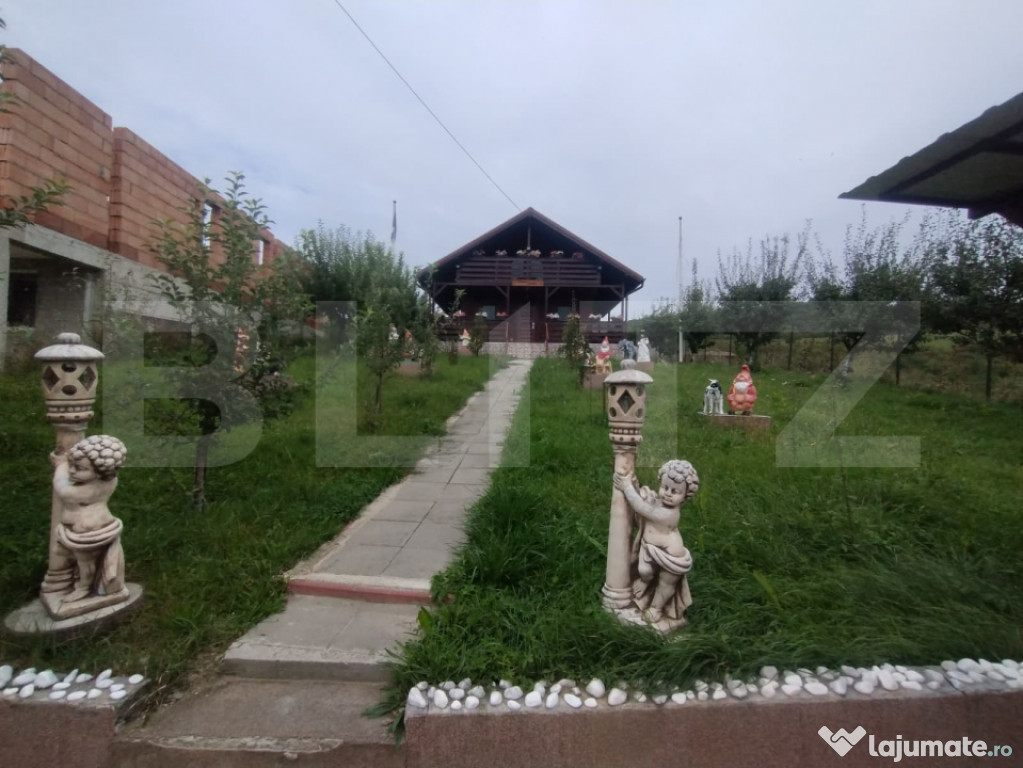 Casa de vacanta din lemn,60 mp,foisor,teren 686 mp extravila