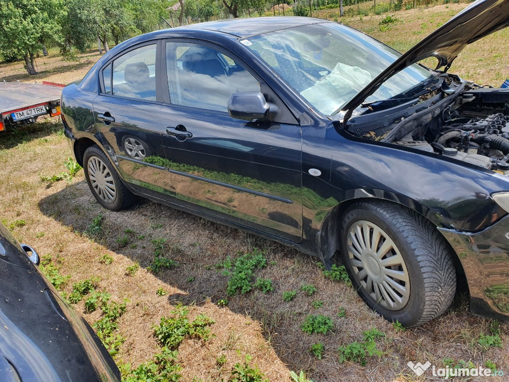 Dezmembrez Mazda 3 an 2005