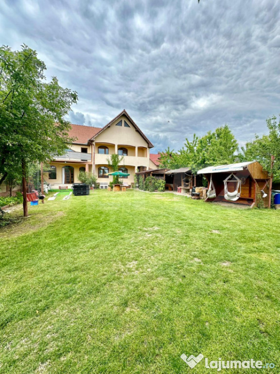 Casa 5 camere,teren 700 mp, foisor si gratar,Micesti