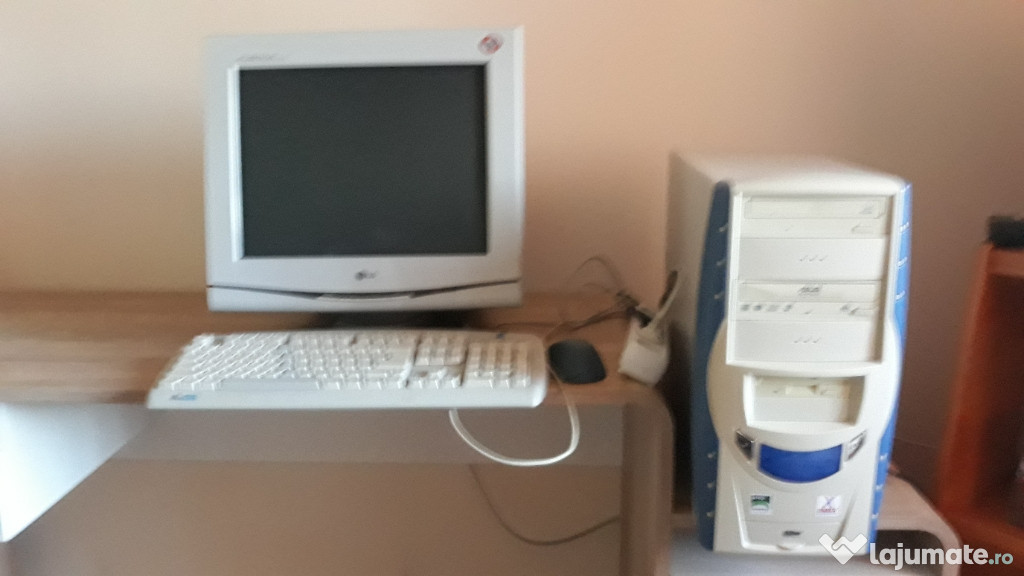 Unitate amd sempron,monitor LG,tastatură,mouse .căști