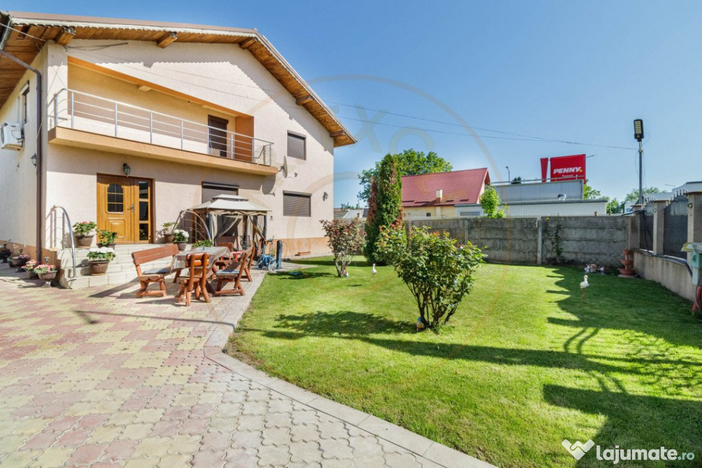 Casa Tunari Central – curte mare, living generos, pozitie