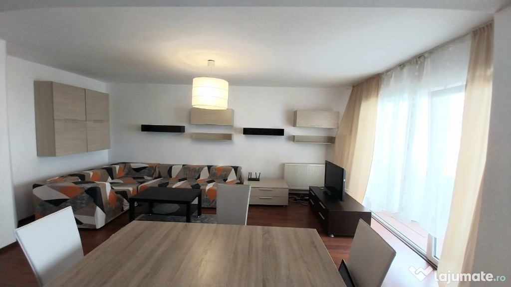 Apartament 2 camere 53 mp,etaj 1 din 3,parcare zona Terra Floresti