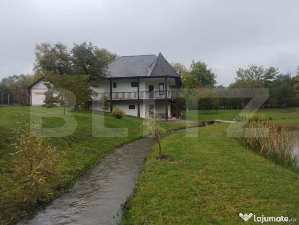 Casa 116 mp cu 5 camere,teren 83 ari +lac de pesti,zona Buda
