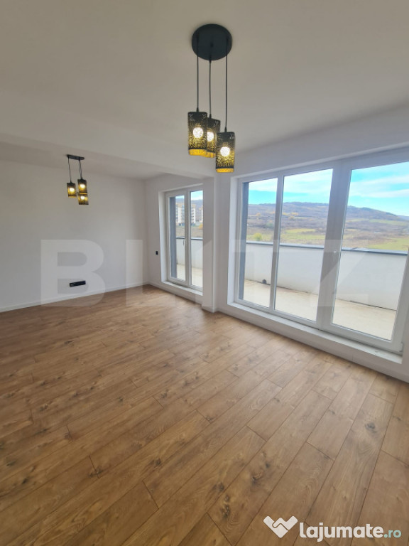 Apartament finisat, 52 mp utili, terasa 34 mp, bucatarie inc