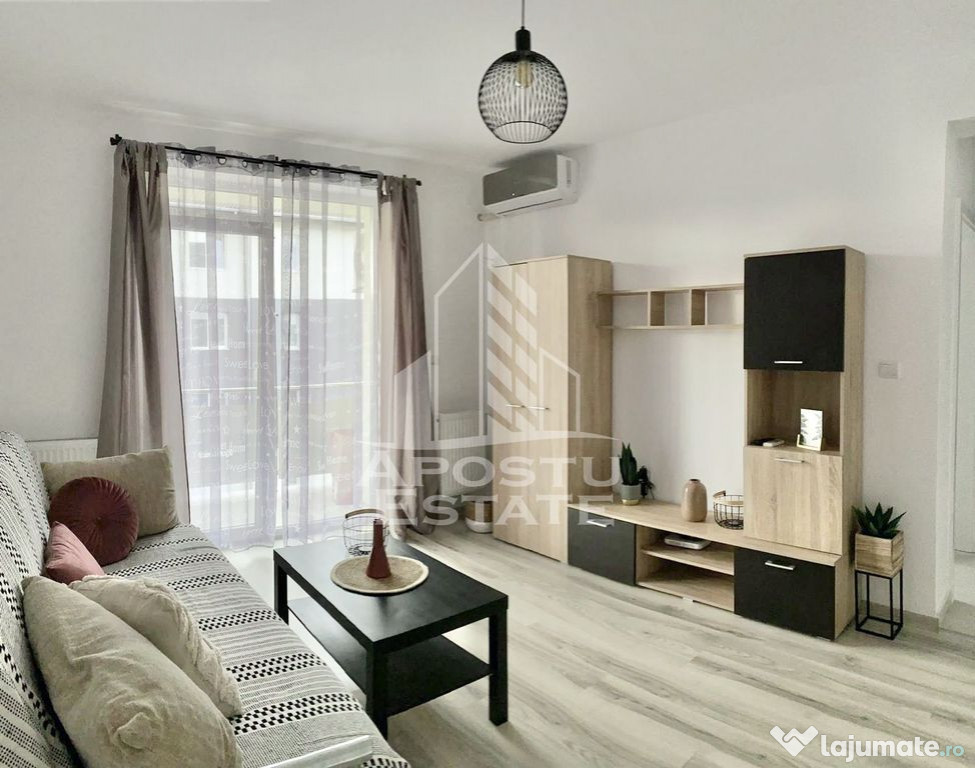 Apartament cu 2 camere complet mobilat si utilat la etaju...