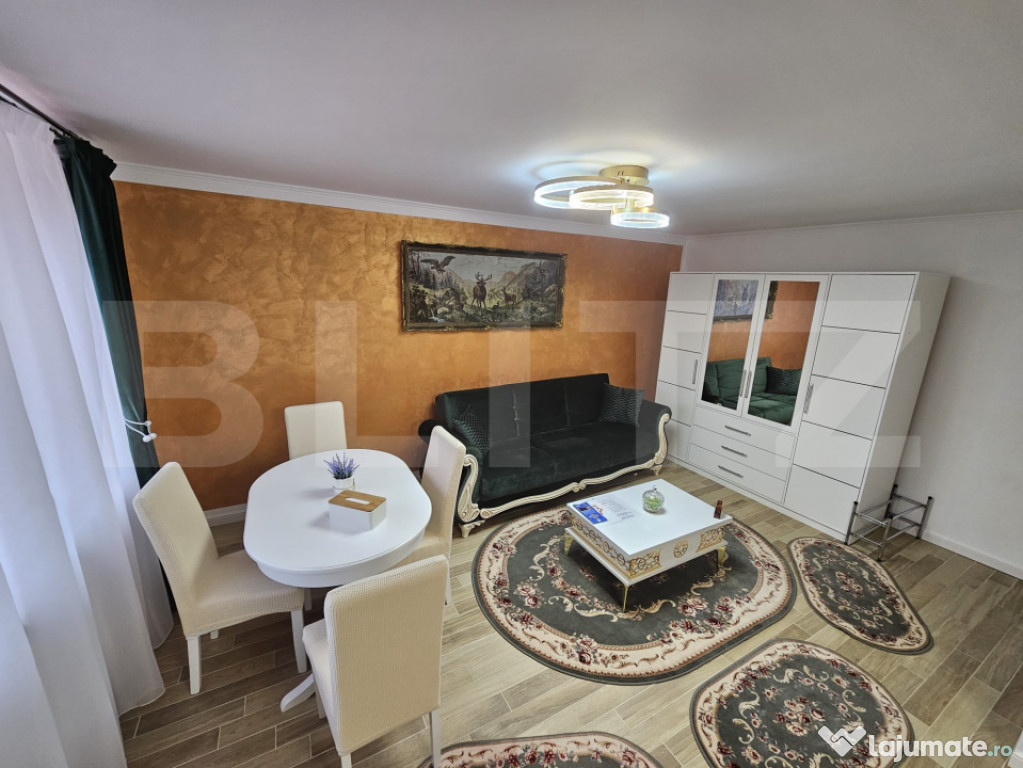 Apartament rafinat într-o casǎ cu curte privatǎ!