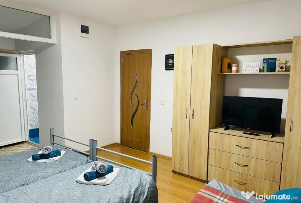 Timpuri noi garsoniera la curte