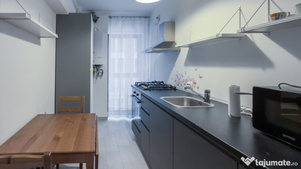 Descoperiți confortul vieții moderne într-un apartament p