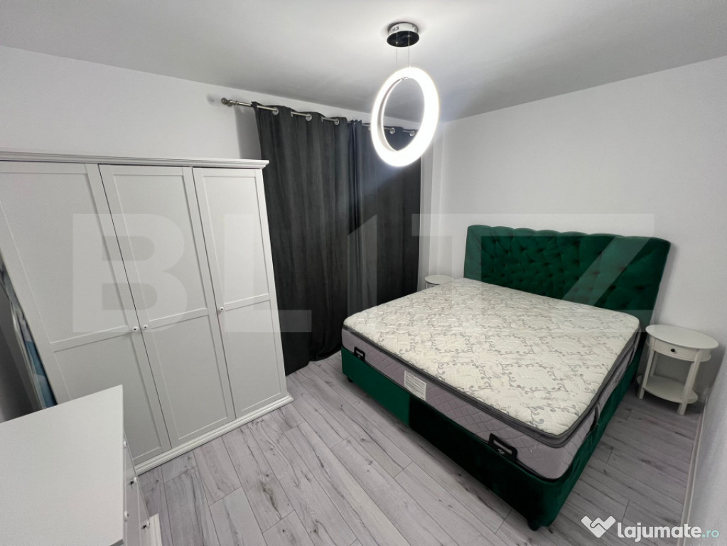 Apartament 2 camere modern cu curte proprie și parcare –