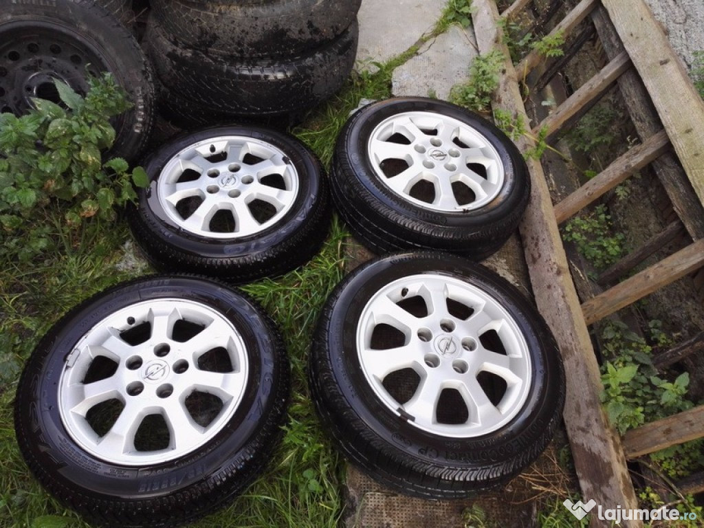 4 buc roţi opel astra G R15 5x110 5 prezoane cauciuc 2bu