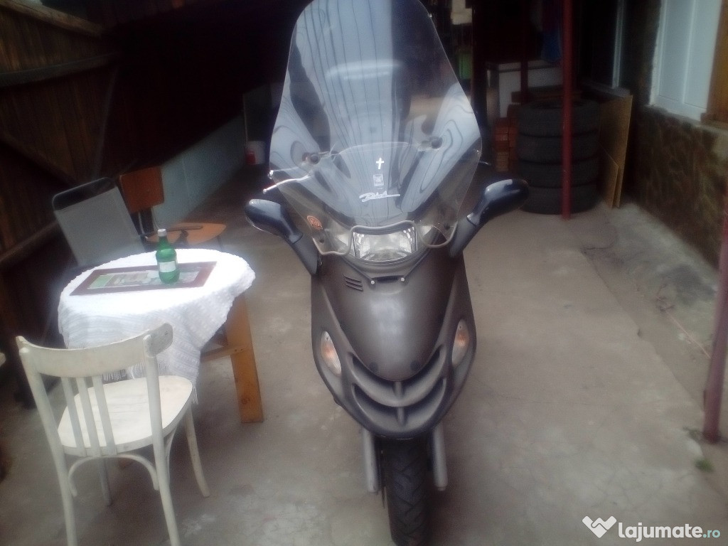 Kymco dink+ 2 casti cadou