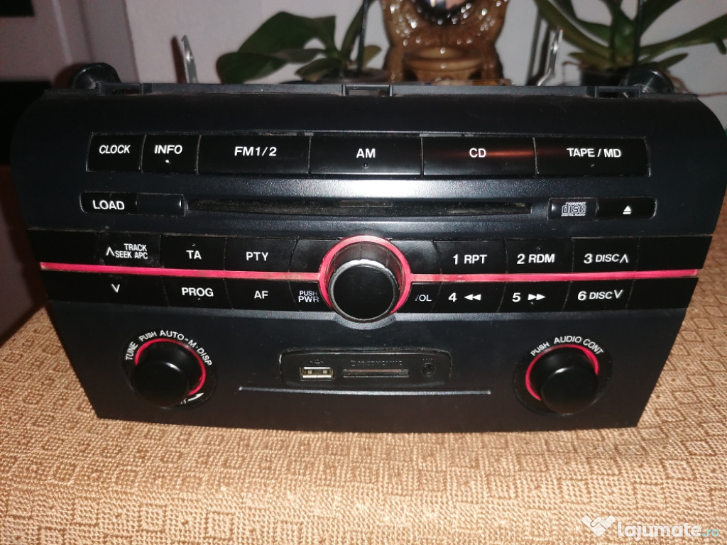 Cd player mazda 3 an 2005