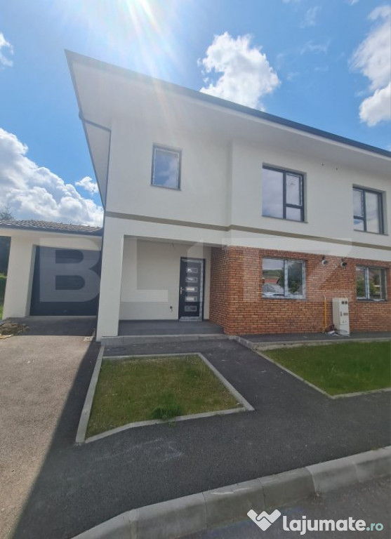 Casa cu 4 camere, 130 mp utili, garaj, acces restrictionat,
