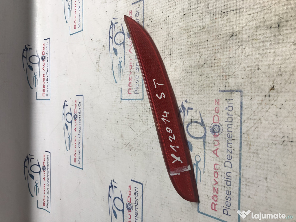 Catadioptru reflectorizant stanga BMW X1 2014