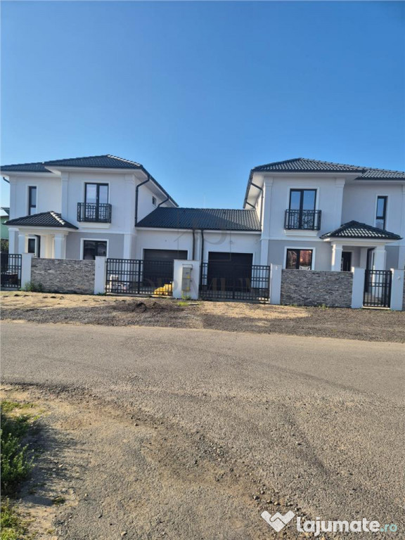 Duplex despartit prin garaj - 130 mp utili - teren 450 mp -