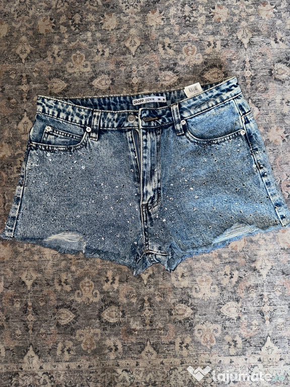 Pantaloni albaștri cu pietricele