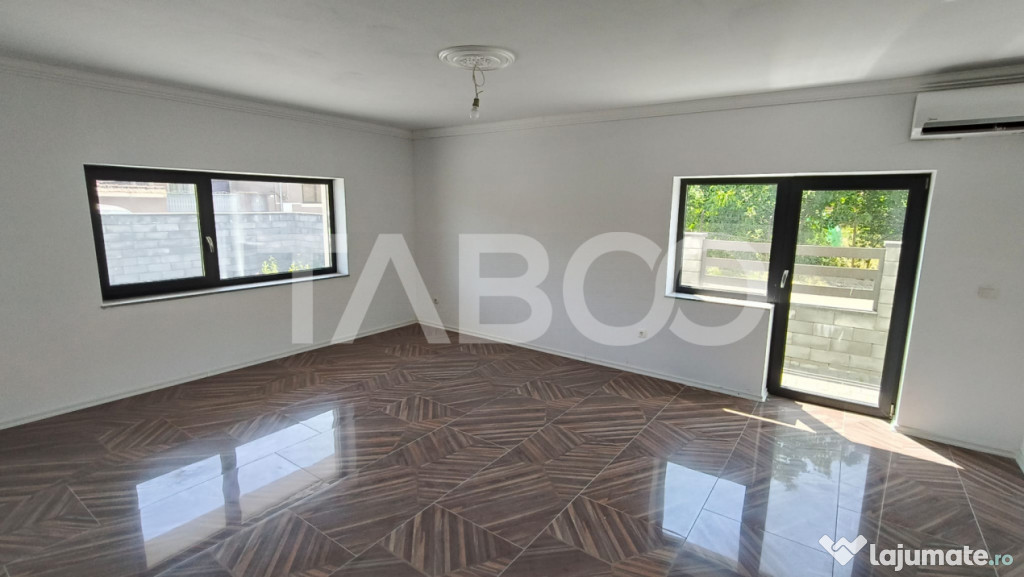 Apartament de vanzare cu 2 camere si curte proprie in bloc n