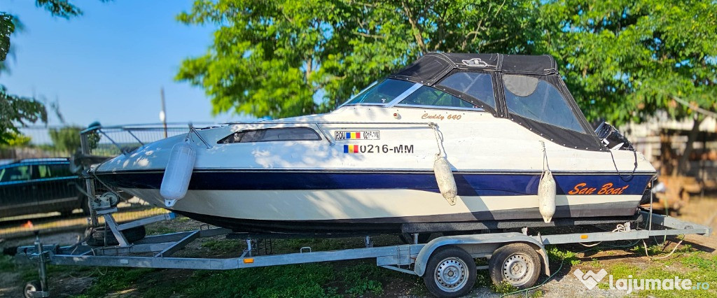 Barcă M460 Cuddy 6,4 m + Suzuki 175 CP + peridoc 2 axe – 2007