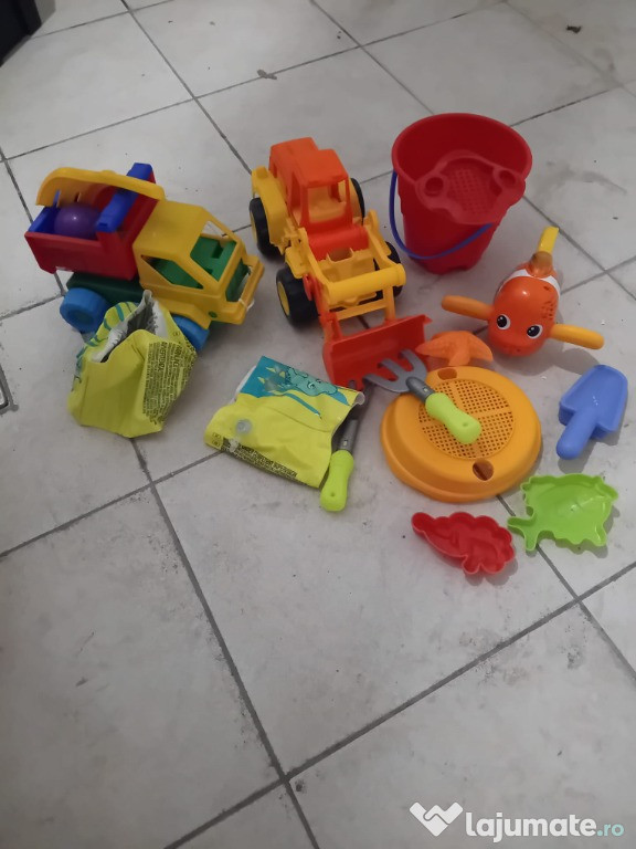 Jucării plajă și aripioare pentru apă