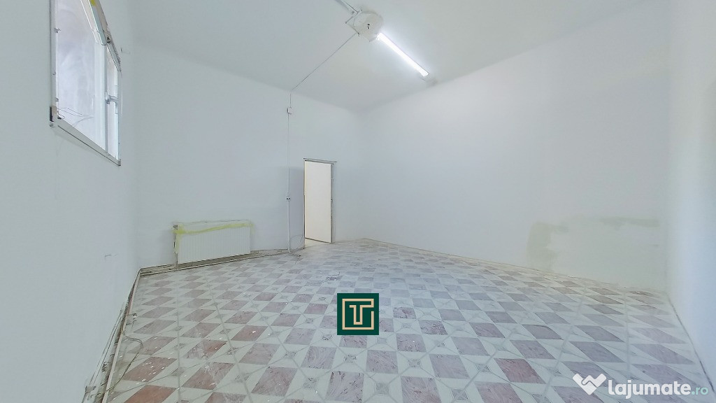 Apartament cu potential cu 2 camere la curte comuna in Centru