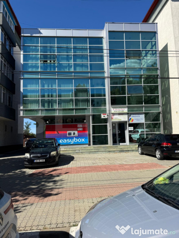 Clădire modernă în centrul orașului Titu, cu randament g