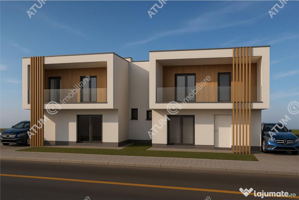 Casa de 4 camere decomandate cu 2 bai si teren de 200 mp in