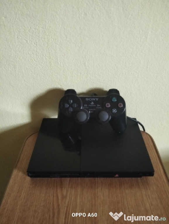 Vând PlayStation 2 Slim