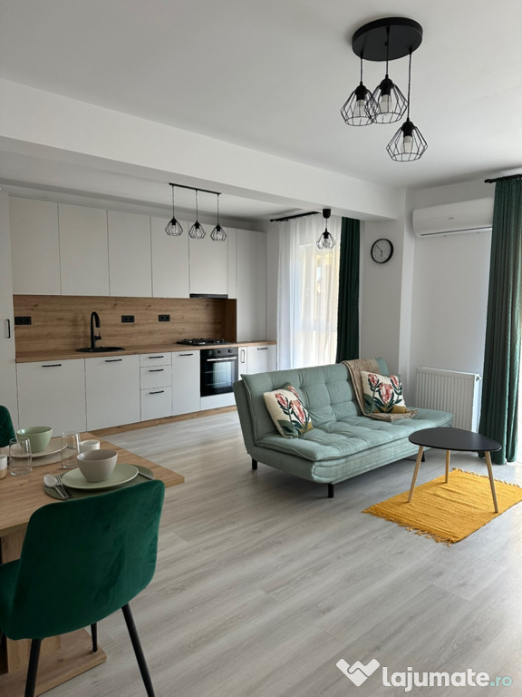 Închiriez apartament 2 camere + parcare acoperita