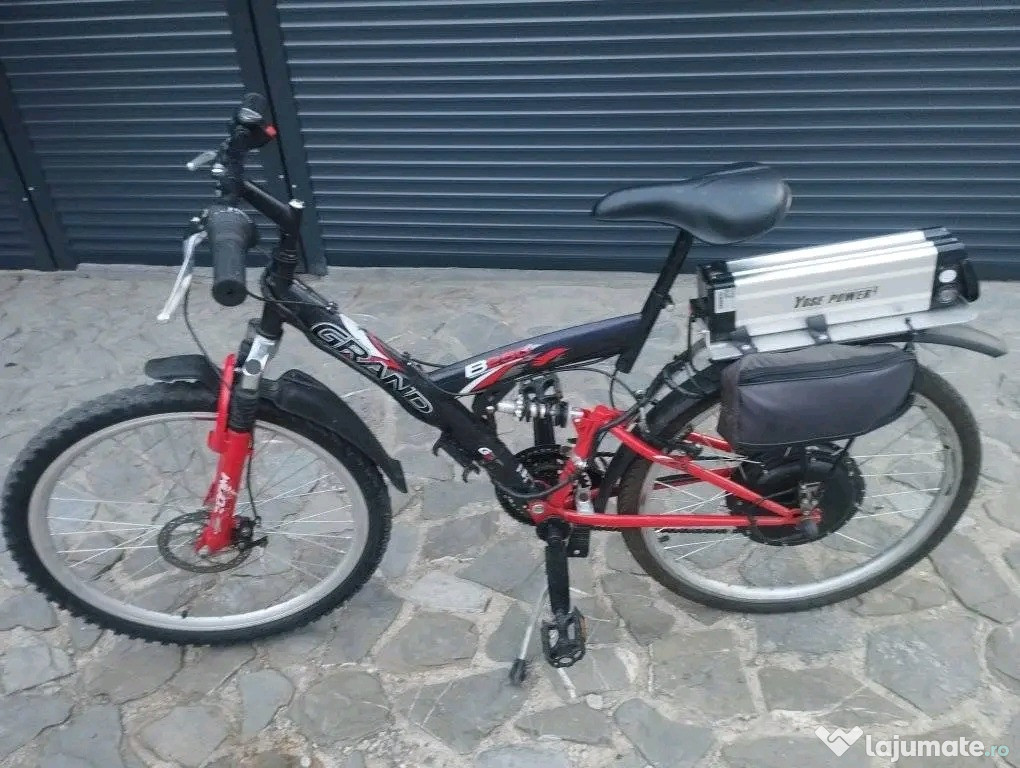 Bicicletă electrică cu accelerație și asistata la pedale