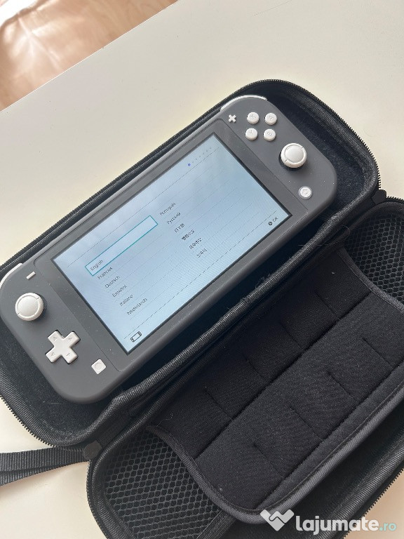 Consola nintendo switch lite + 2 jocuri + husa