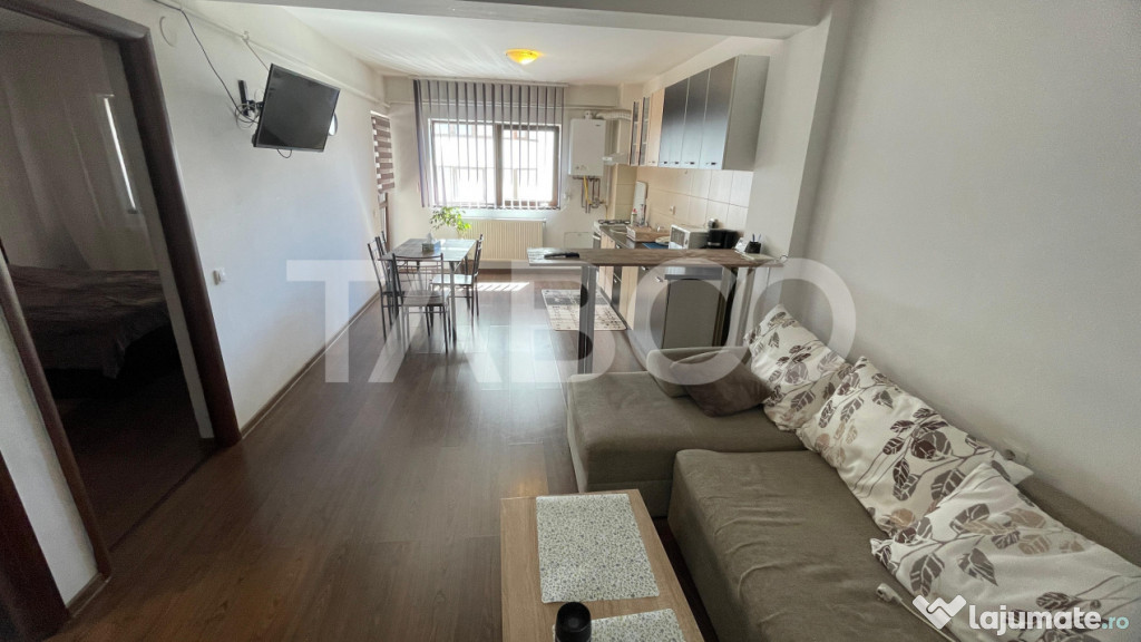 Apartament cu 2 camere balcon si loc de parcare de inchiriat