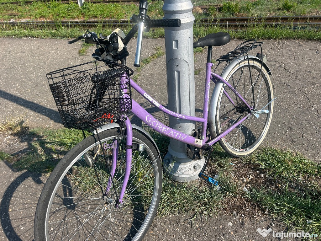 Vând bicicleta , stare buna , culoare mov