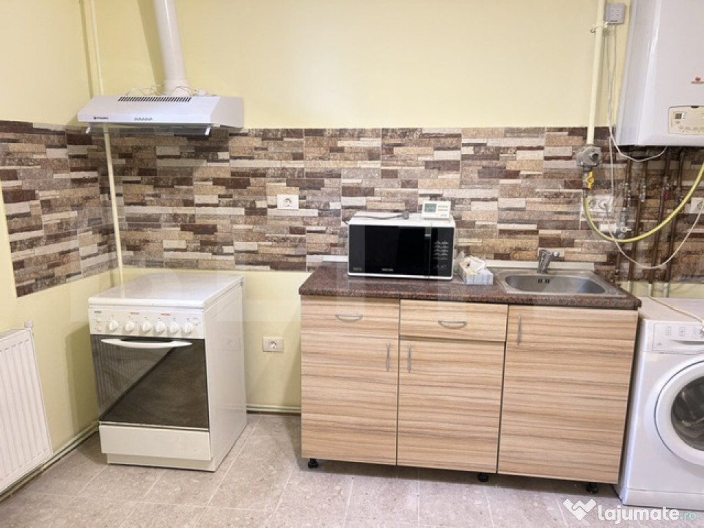 Ap. 2 camere demisol, central, zona Hasdeu