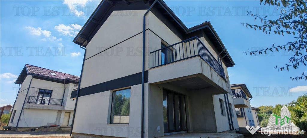 Vila individuala cuplata, in complex rezidential modern, cu