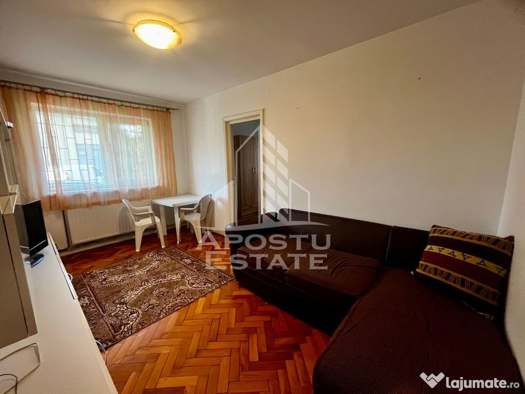 Apartament cu 2 camere, parter,centrala proprie,zona Olim...
