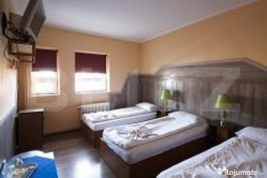 Pensiune de inchiriat camere cu multe paturi pretabil muncit