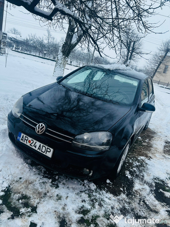 Golf V, 1,6 benzină.
