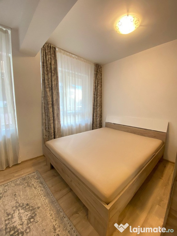 Apartament 2 camere, bloc nou, mobilat și utilat + loc parcare