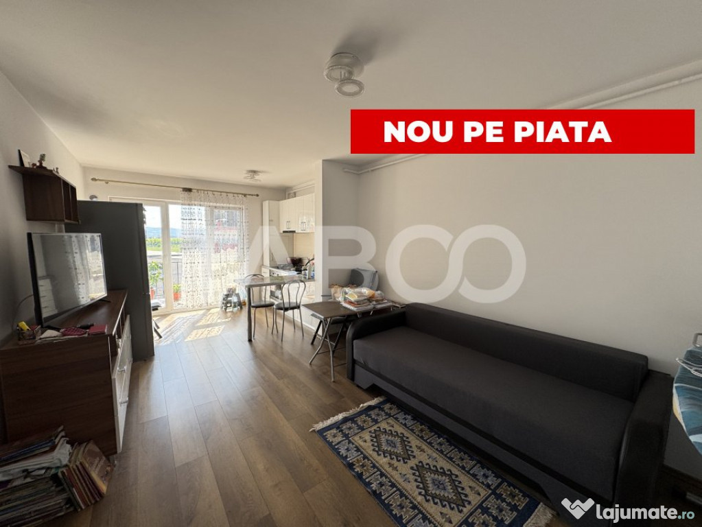 Apartament etaj intermediar 2 camere balcon bloc cu lift Mag