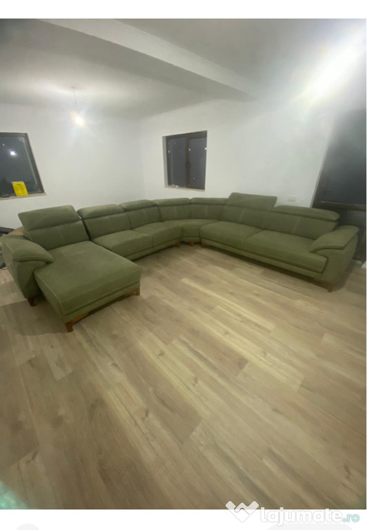 Canapea extensibil pe buton electric