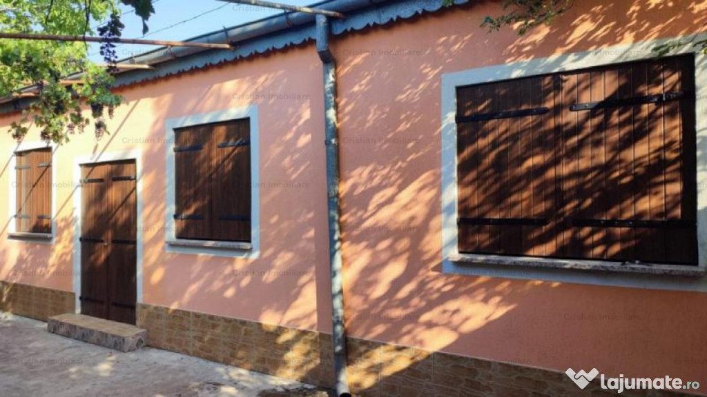 Casa cu 600mp de teren si 13m front stradal, toate utilitati