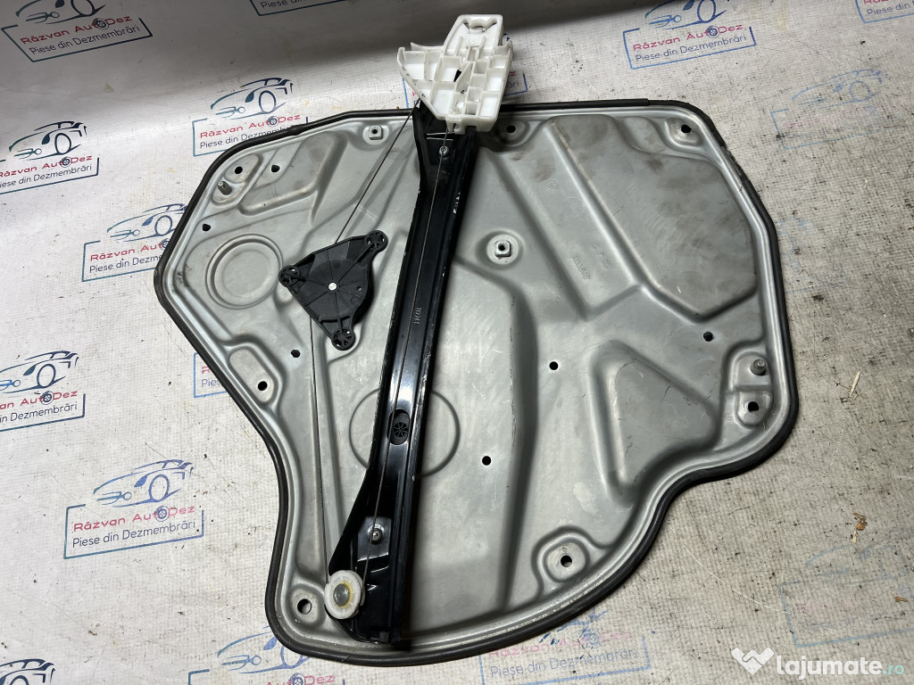 Macara geam stanga spate Skoda Octavia 2 2011