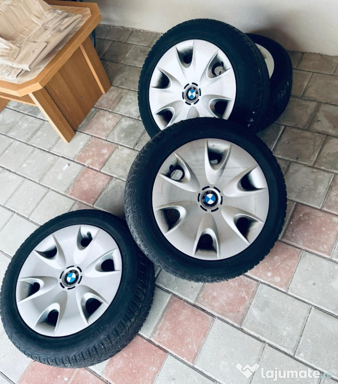 Jante de oțel + cauciucuri (uzate) de iarnă + capace originale BMW 205