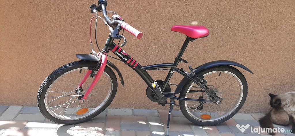 Bicicleta fetita .Foarte putin Folosits