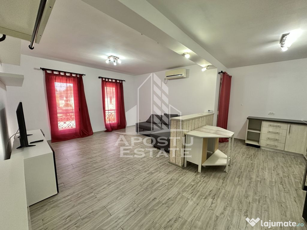 Apartament cu 2 camere complet mobilat si utilat la etaju...