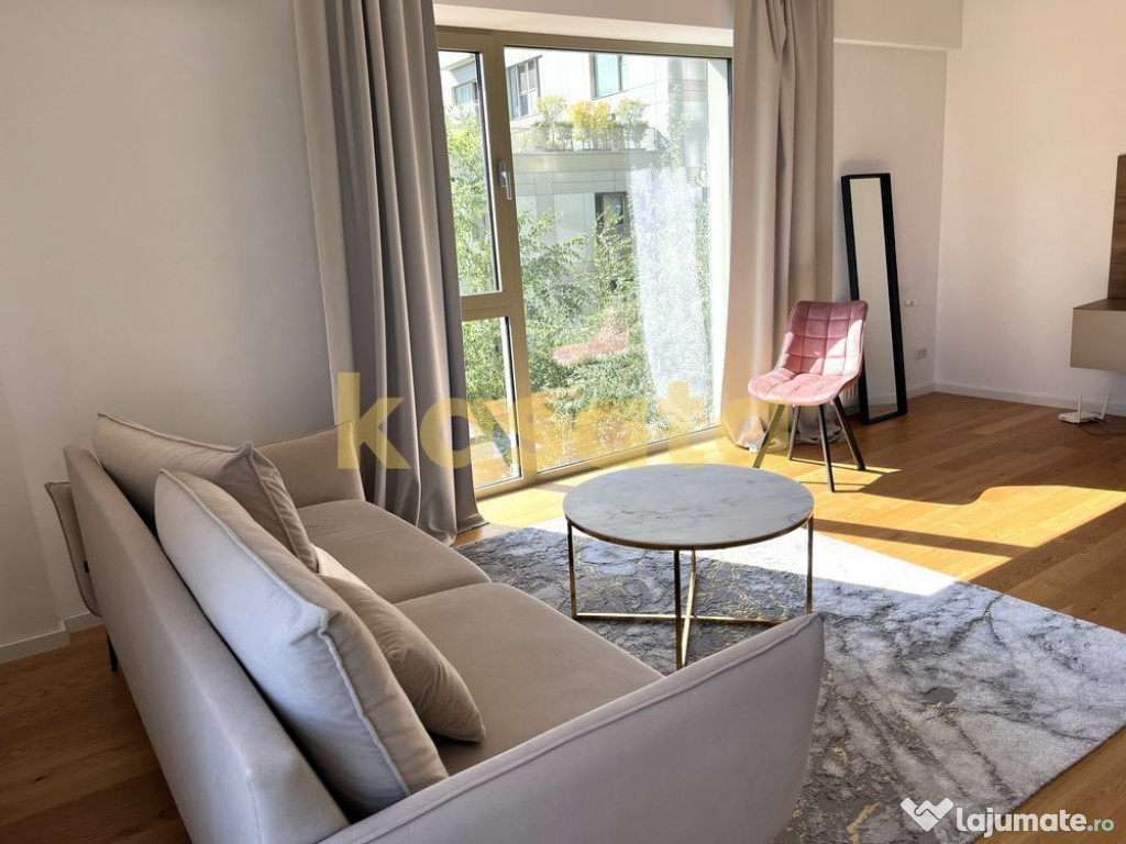 Apartament cu 2 camere, terasă și vedere spre grădină...